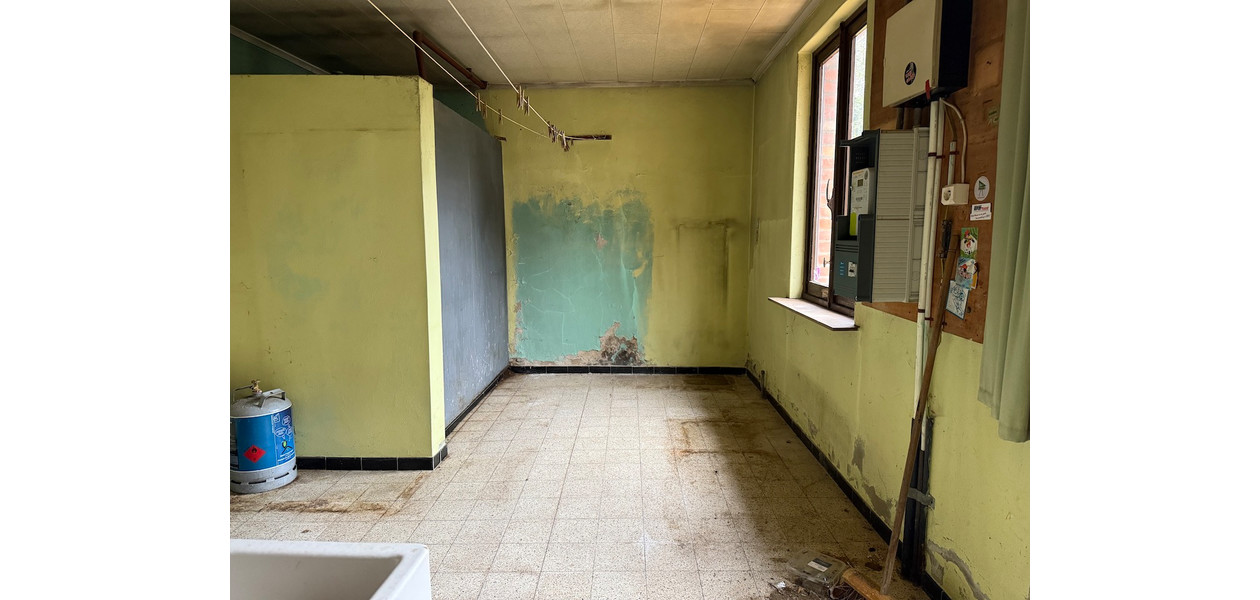 RUIME TE RENOVEREN GEZINSWONING MET TUIN