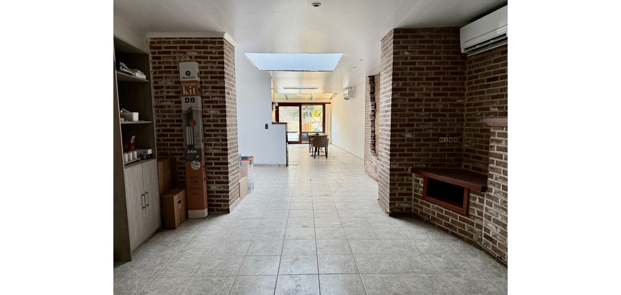 CENTRAAL GELEGEN FAMILIALE WONING MET 4 SLPKMRS EN TUIN.