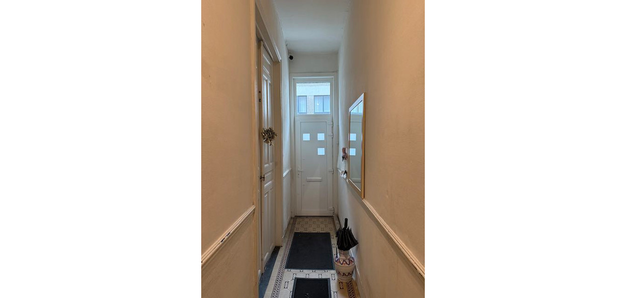 IN VOLLE CENTRUM, GEZINSWONING MET 3 SLAAPKAMERS EN TUIN