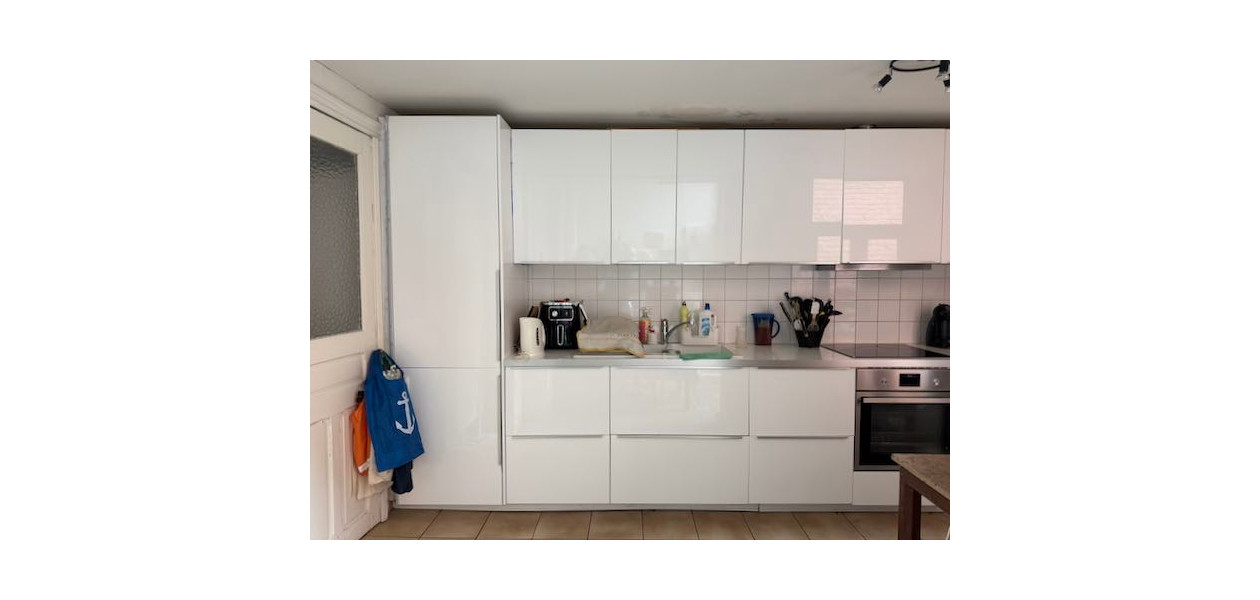 IN VOLLE CENTRUM, GEZINSWONING MET 3 SLAAPKAMERS EN TUIN