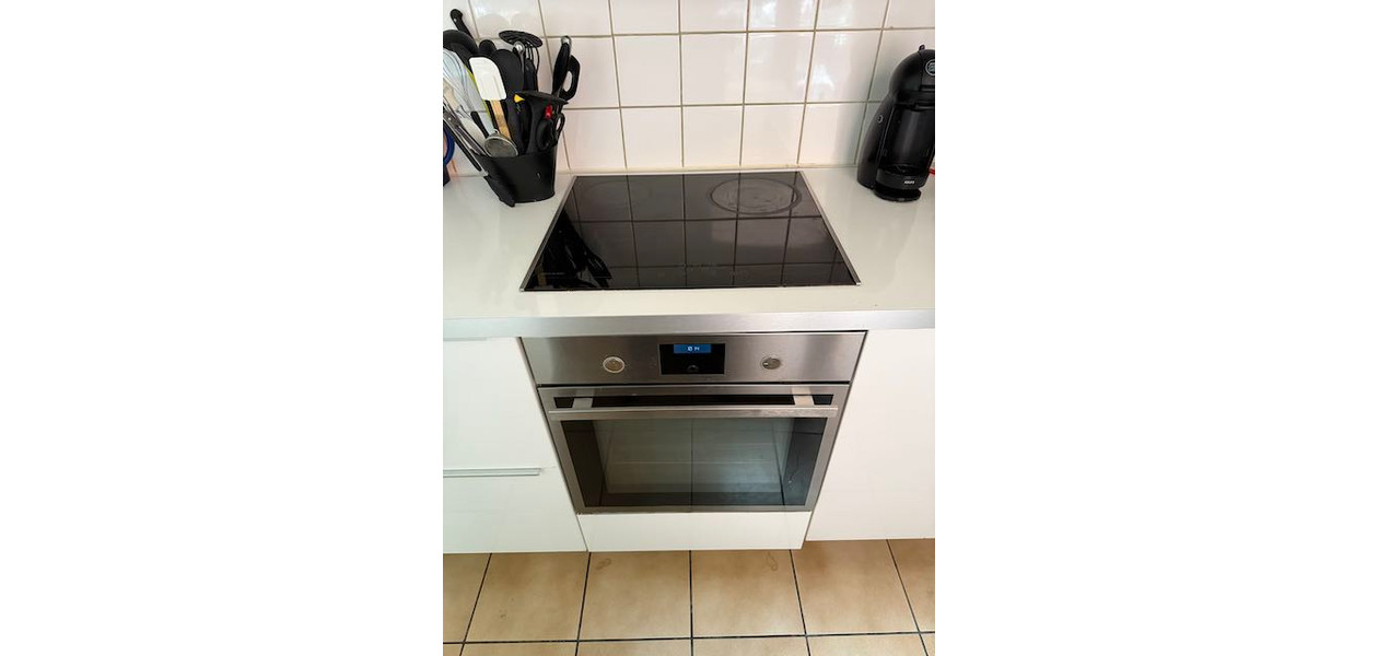 IN VOLLE CENTRUM, GEZINSWONING MET 3 SLAAPKAMERS EN TUIN