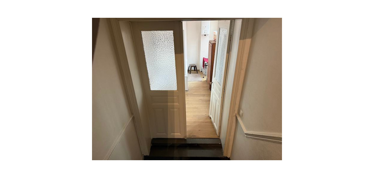 IN VOLLE CENTRUM, GEZINSWONING MET 3 SLAAPKAMERS EN TUIN