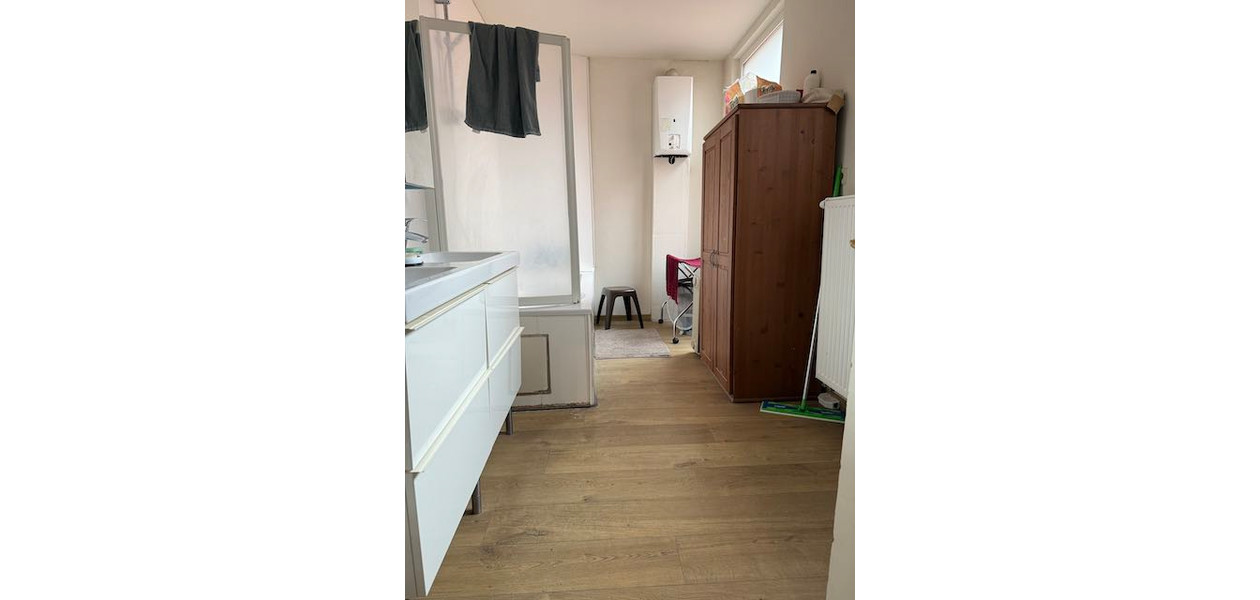 IN VOLLE CENTRUM, GEZINSWONING MET 3 SLAAPKAMERS EN TUIN