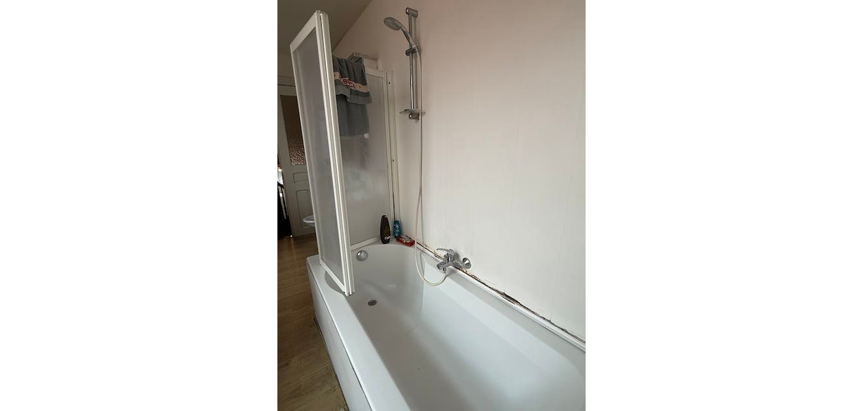 IN VOLLE CENTRUM, GEZINSWONING MET 3 SLAAPKAMERS EN TUIN