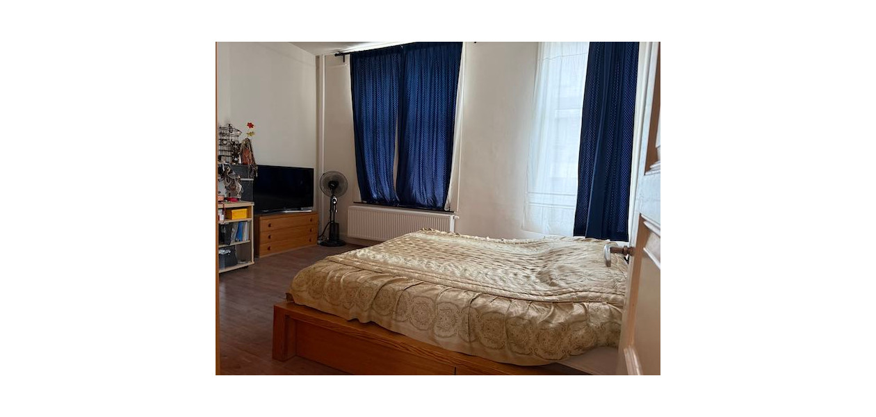 IN VOLLE CENTRUM, GEZINSWONING MET 3 SLAAPKAMERS EN TUIN