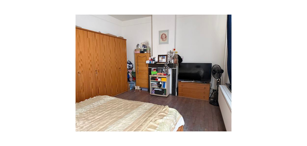 IN VOLLE CENTRUM, GEZINSWONING MET 3 SLAAPKAMERS EN TUIN