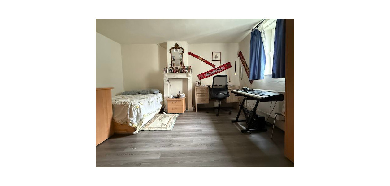 IN VOLLE CENTRUM, GEZINSWONING MET 3 SLAAPKAMERS EN TUIN