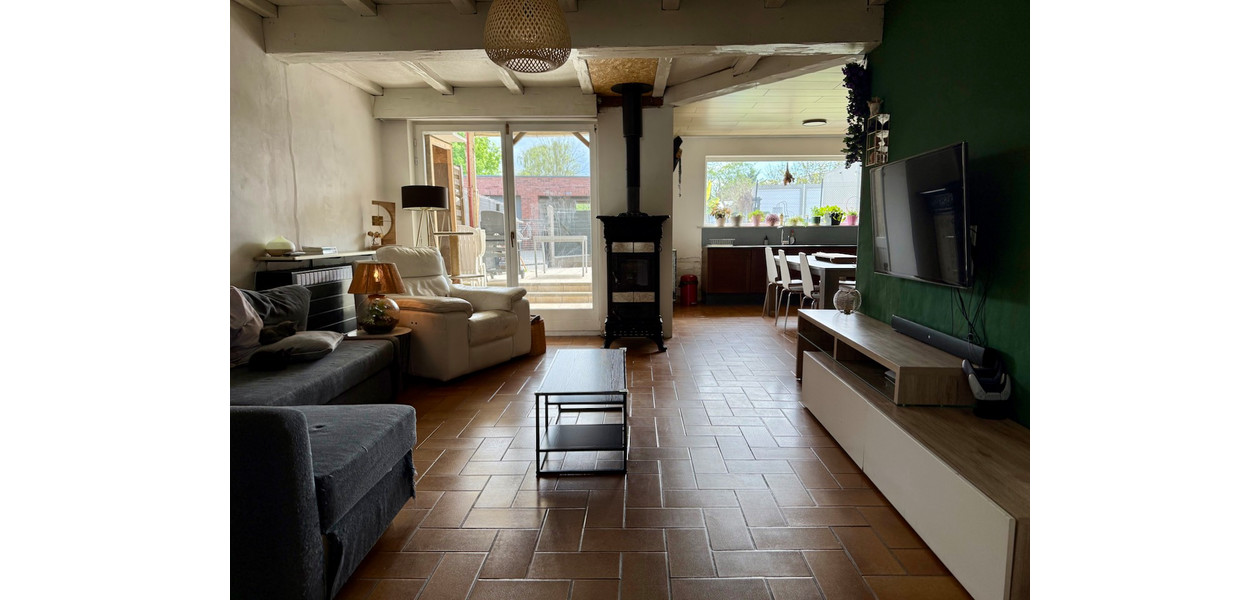 GEZELLIGE FAMILIALE WONING MET 3 SLPKMRS EN LEUKE TUIN